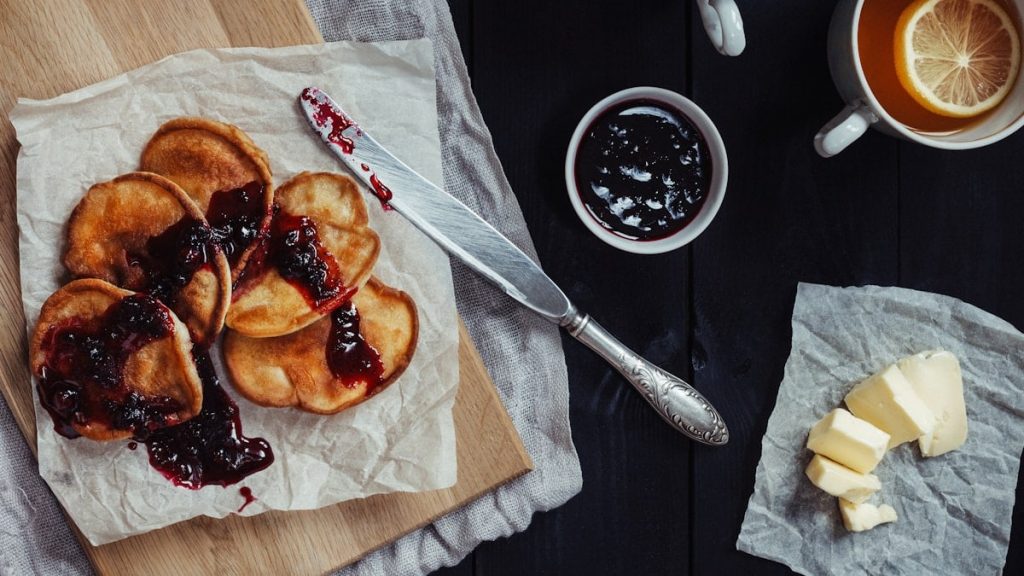Homemade rural pancakes with jam