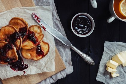 Homemade rural pancakes with jam