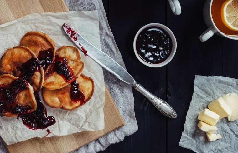 Homemade rural pancakes with jam
